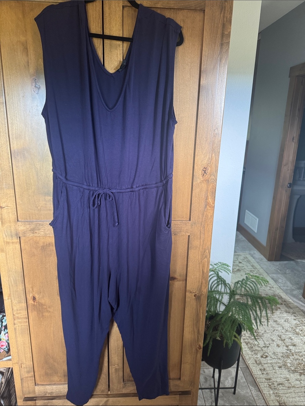 Torrid size 3 Navy knit Super soft material jumpsuit. V neck in front and back